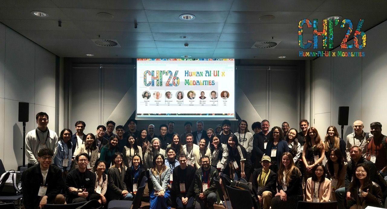 Group photo of the Human–AI–UI workshop participants